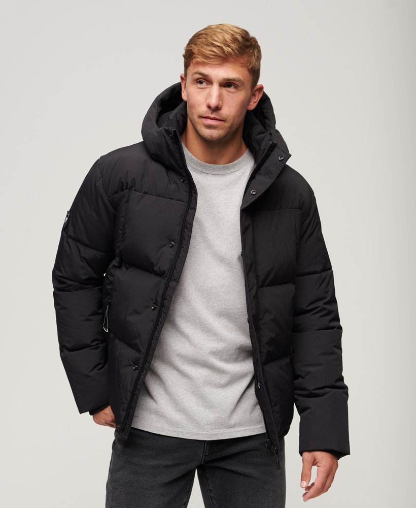Men's black puffer jacket is a versatile and practical outerwear piece that provides warmth, comfort, and style.