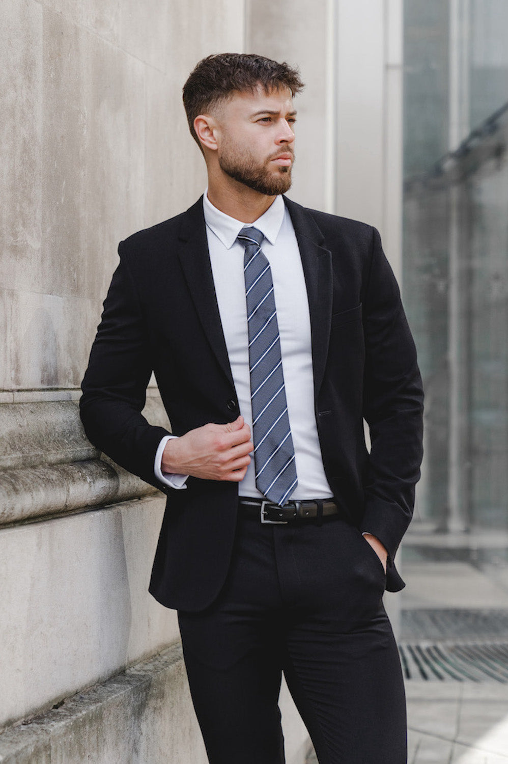 How should a suit coat fit?